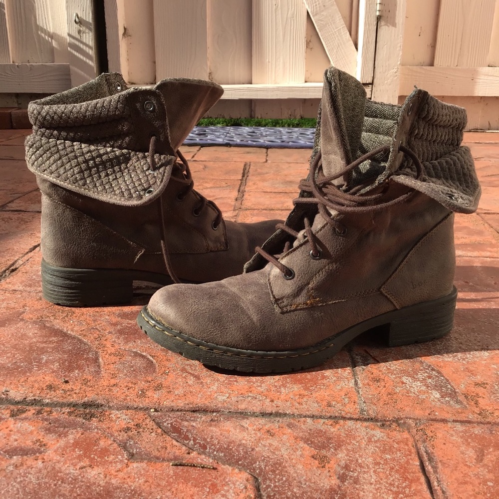 Brown combat style boots.